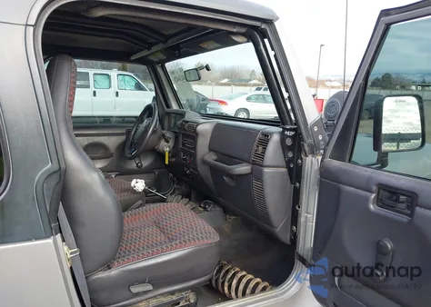 2000 Jeep Wrangler Sport z USA, uszkodzony, nr VIN 1J4FA49S2YP797321